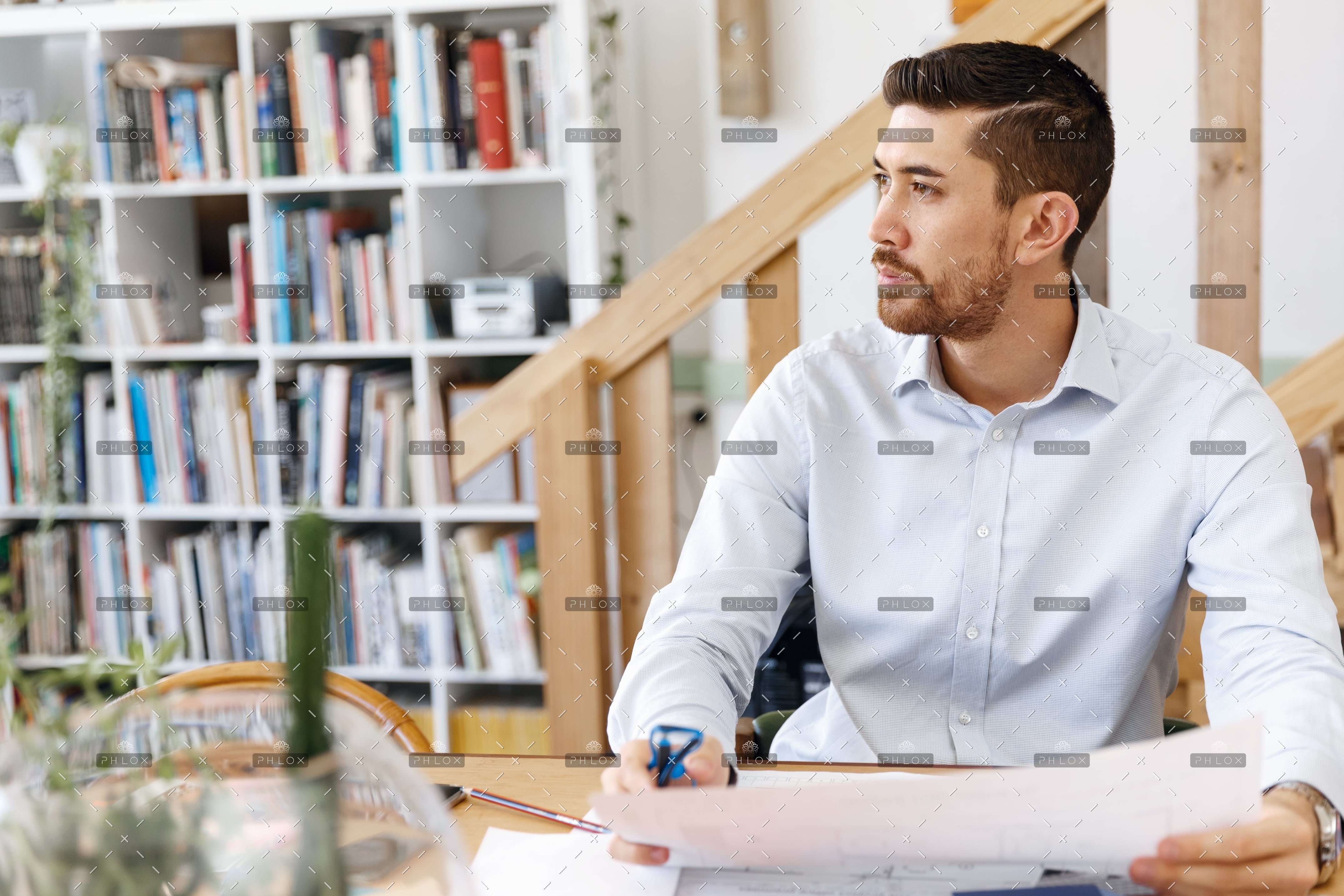 demo-attachment-20-young-man-architect-in-office-PPMNPNG-min